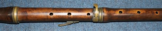 An early 19th century brass mounted concert flute, 23.75in.